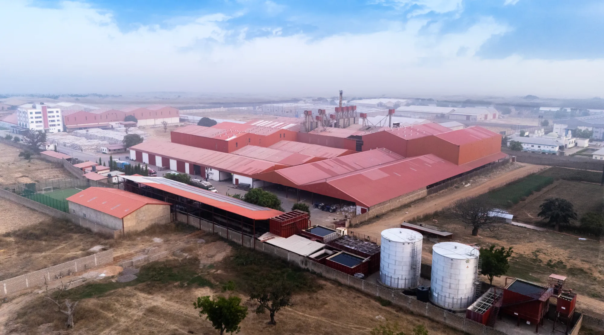 Silos and vertical processing towers at the rice manufacturing unit